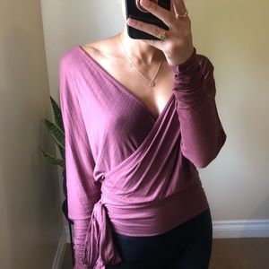 Elan surplice neck side tie wrap top